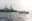 Humanity 1 im Hintergrund, im Vordergrund RHIBs und ein Boot in Seenot