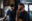 Zwei Crewmitglieder an Bord der Humanity 1 rufen via Funk jemanden an.
