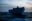Flüchtlingsboot auf dem Mittelmeer bei Nacht