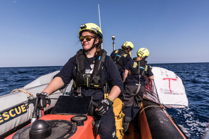 RHIB Driver driving and two other crew members on board.