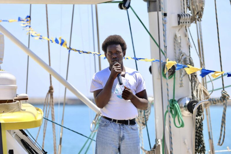 David Yambio is holding a speech at the naming ceremony of Humanity 2 in Licata.